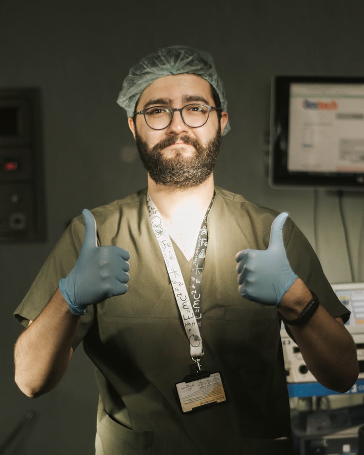 Portrait Of A Doctor With Thumbs Up