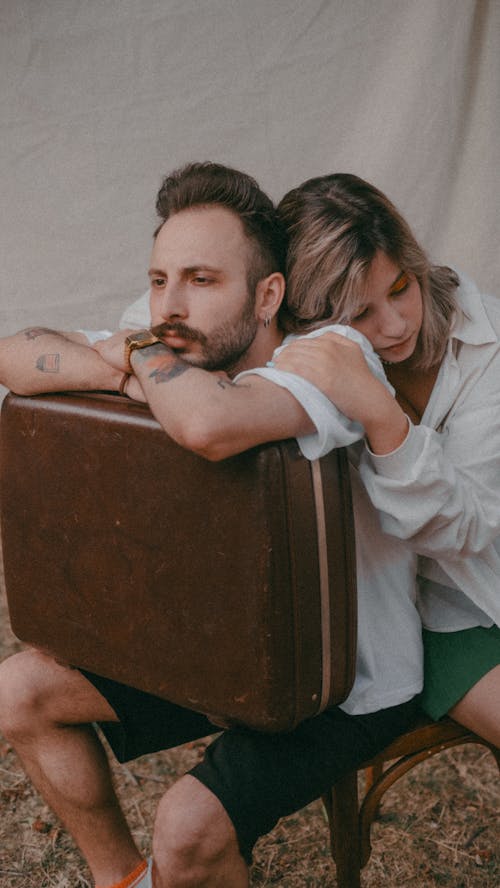 Couple Sitting on a Chair