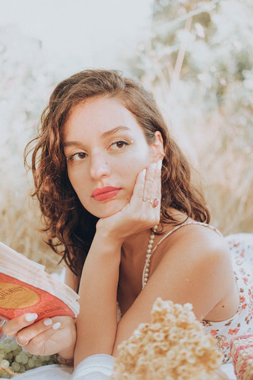 Free Portrait of a Woman with a Book Stock Photo