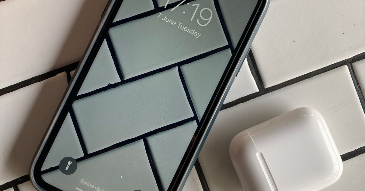 Tiled Phone Smartphone on White Tiles · Free Stock Photo