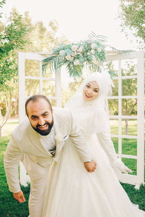 Smiling Newlyweds Posing Together