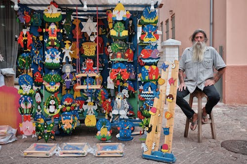 Fotos de stock gratuitas de comercializar, hombre, puesto en el mercado