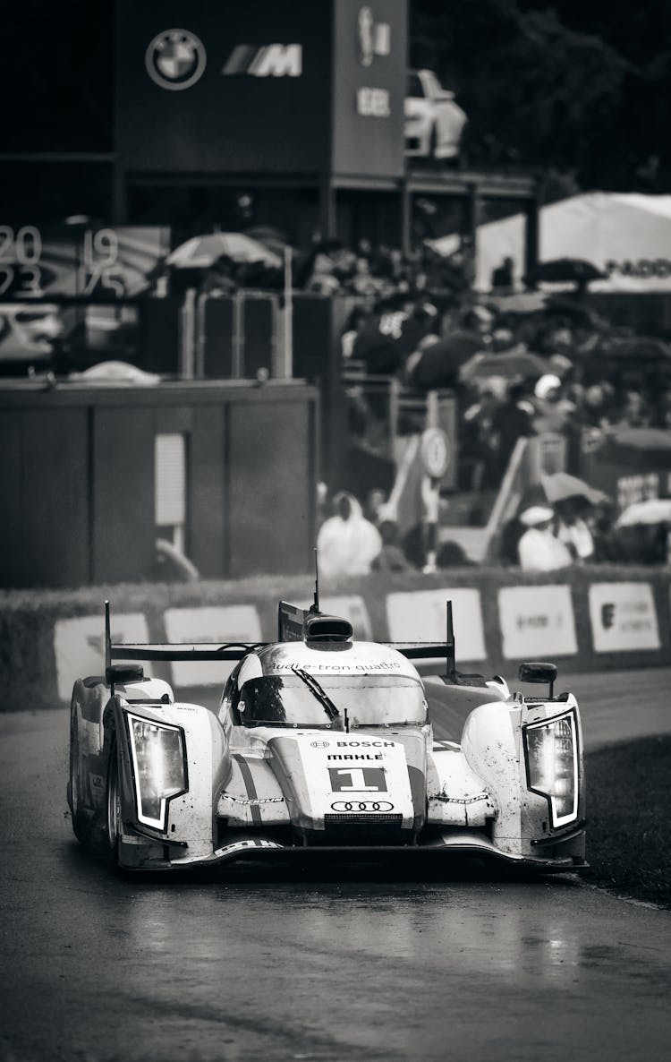 Racing Audi Car On Wet Circuit