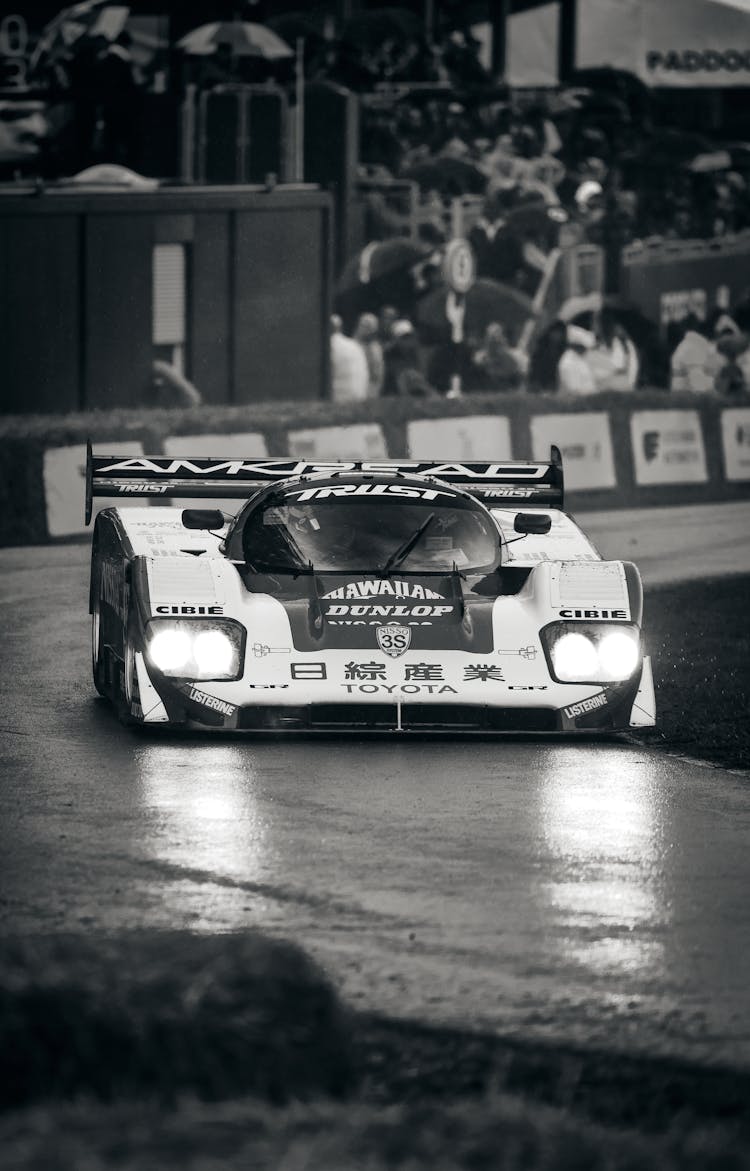 Racing Toyota Car On Wet Circuit