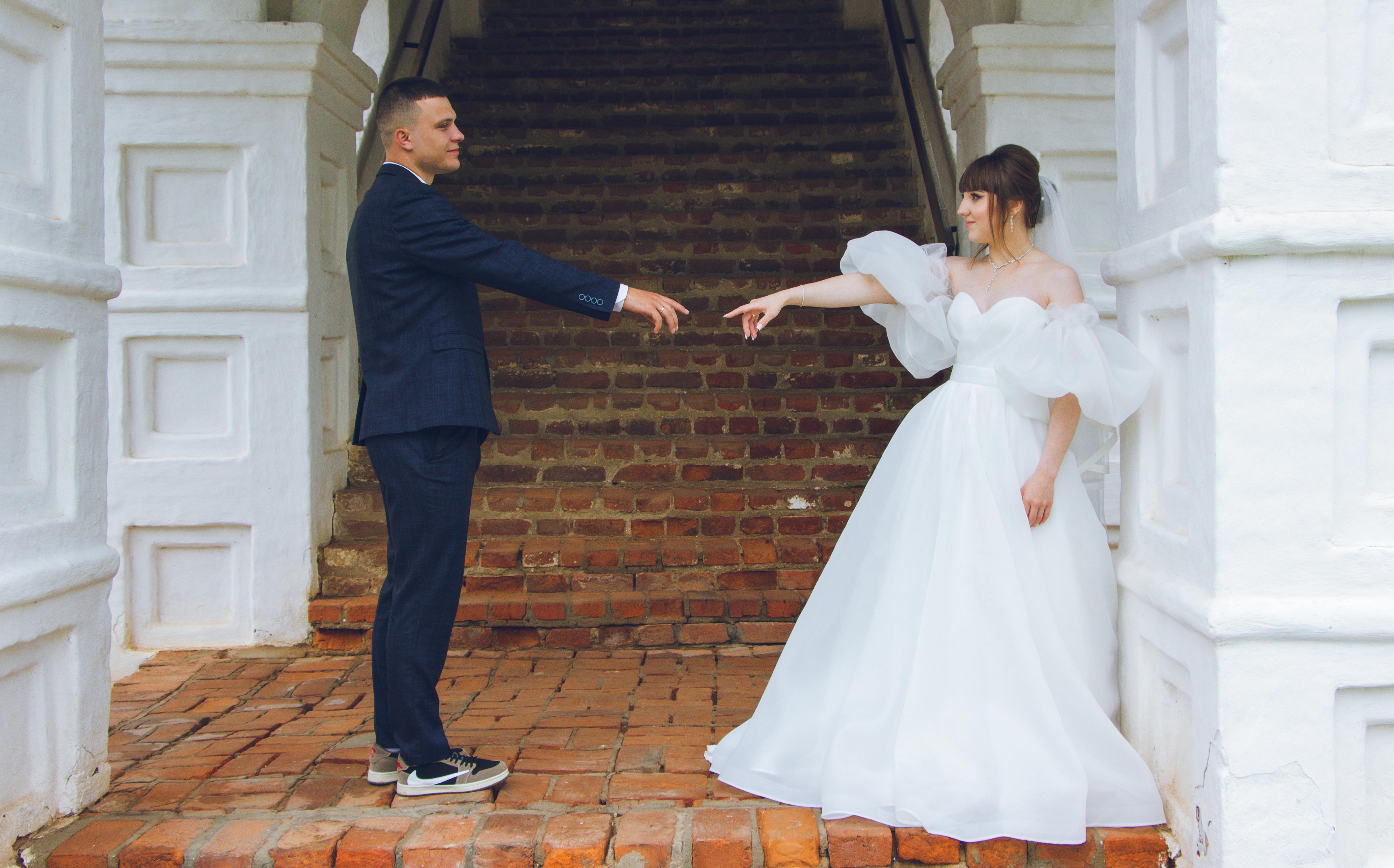 Bride and Groom Standing Opposite Each Other · Free Stock Photo