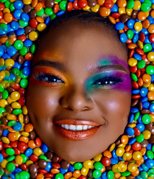 Smiling Face amid Colorful Candy 