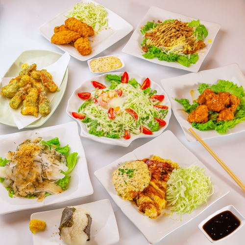 Free A delicious assortment of Asian fusion dishes presented beautifully on white plates. Stock Photo