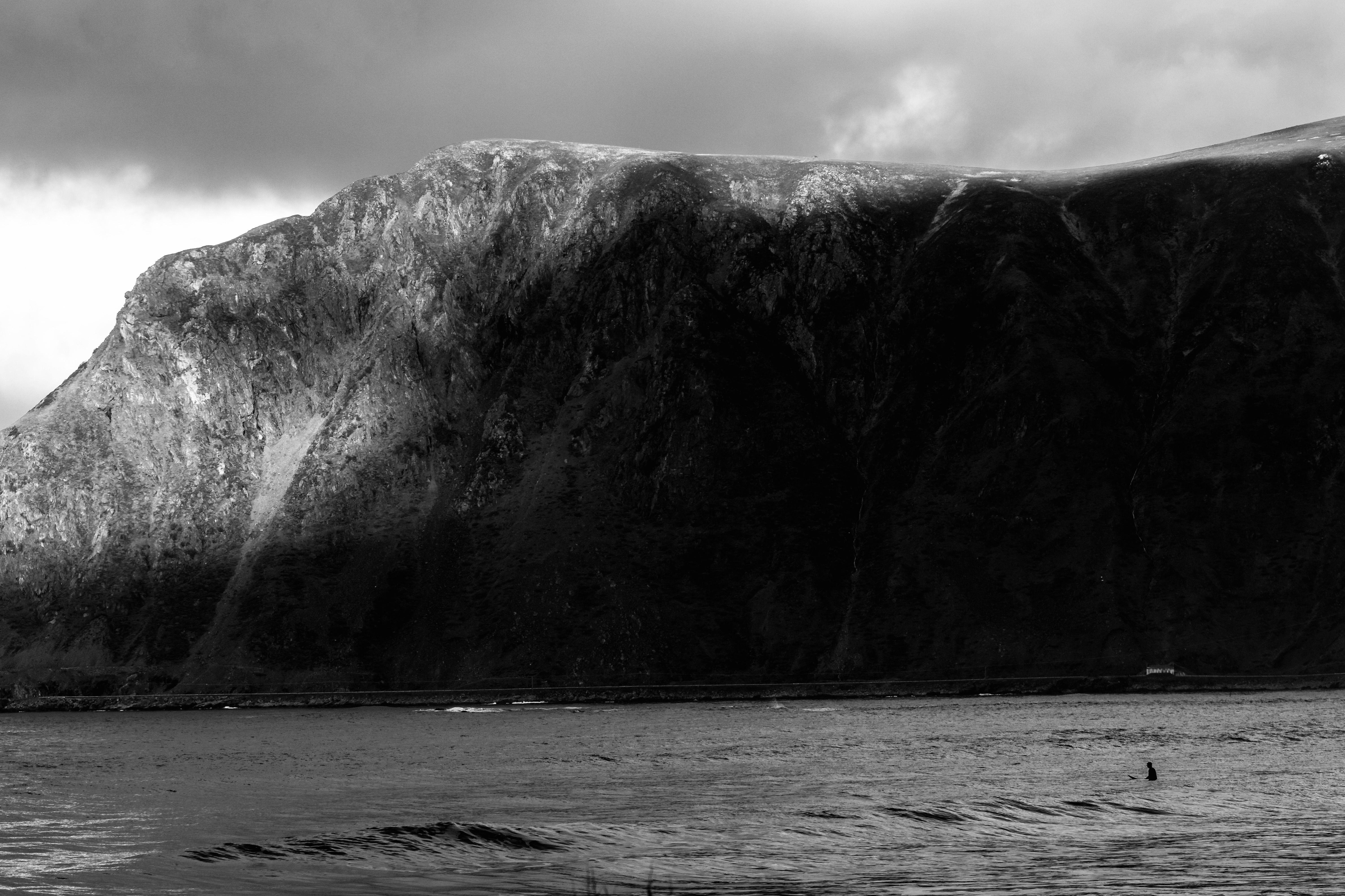Cliff on Sea Shore in Black and White · Free Stock Photo