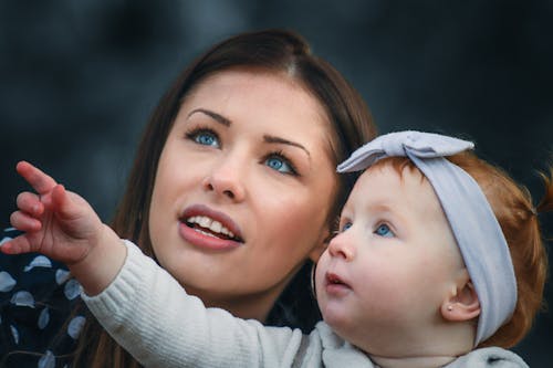 Mother and Daughter Looking in the same Direction