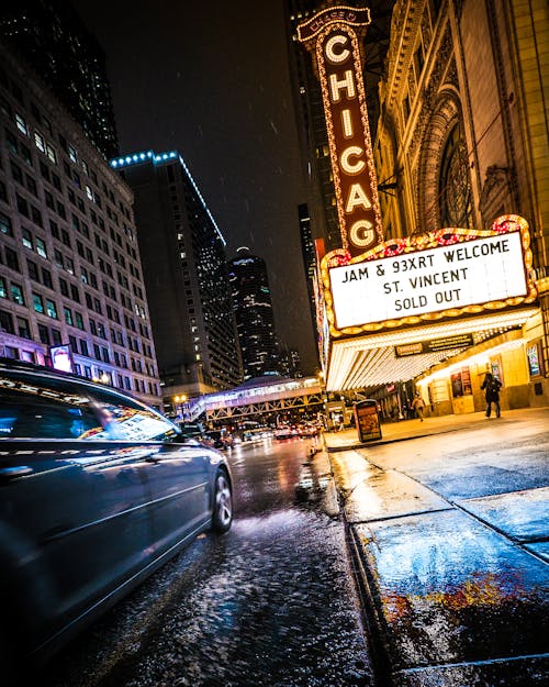 People Walking in Chicago Building during Nighttime