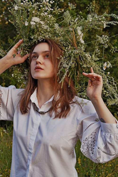 Woman in Shirt and Flowers Wreath