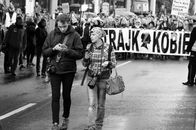 Black and white image of a protest in Wrocław, highlighting women's rights demonstration.