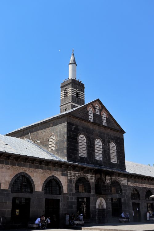 Free Stunning view of the historic Grand Mosque in Diyarbakır, Turkey under a clear blue sky. Stock Photo