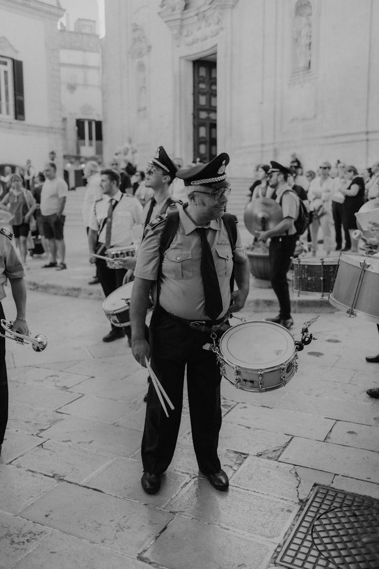 People With Drums On Parade In Town