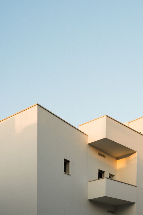 Free Contemporary building in Polignano a Mare, Italy with a clear blue sky. Stock Photo