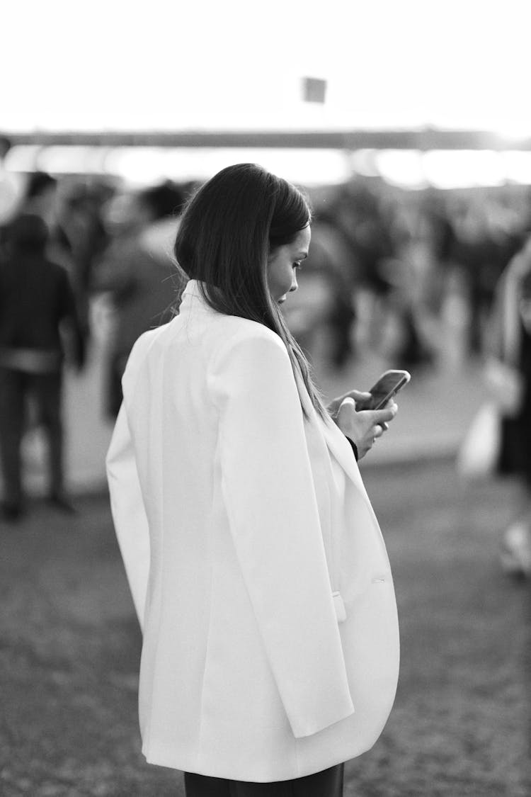 Elegant Woman Using Phone