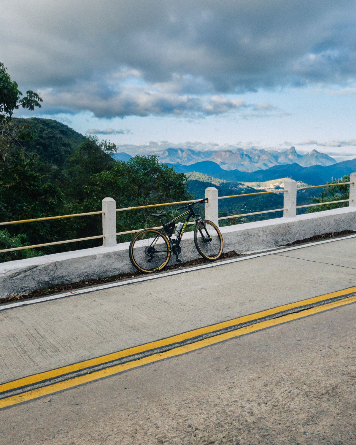 Bicycle beside a scenic mountain road