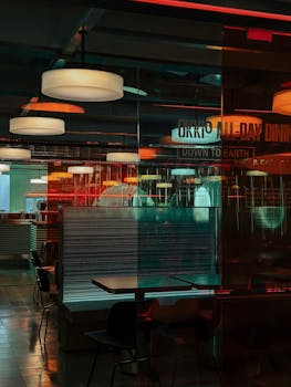 Stylish indoor dining area with contemporary lighting in a Vietnamese restaurant at night.