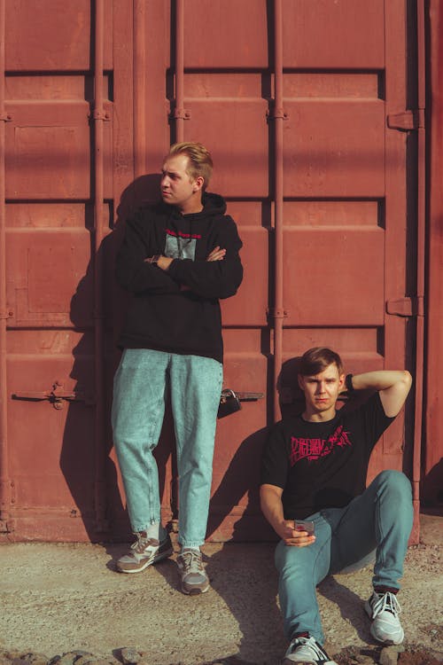 Men in front of Cargo Container