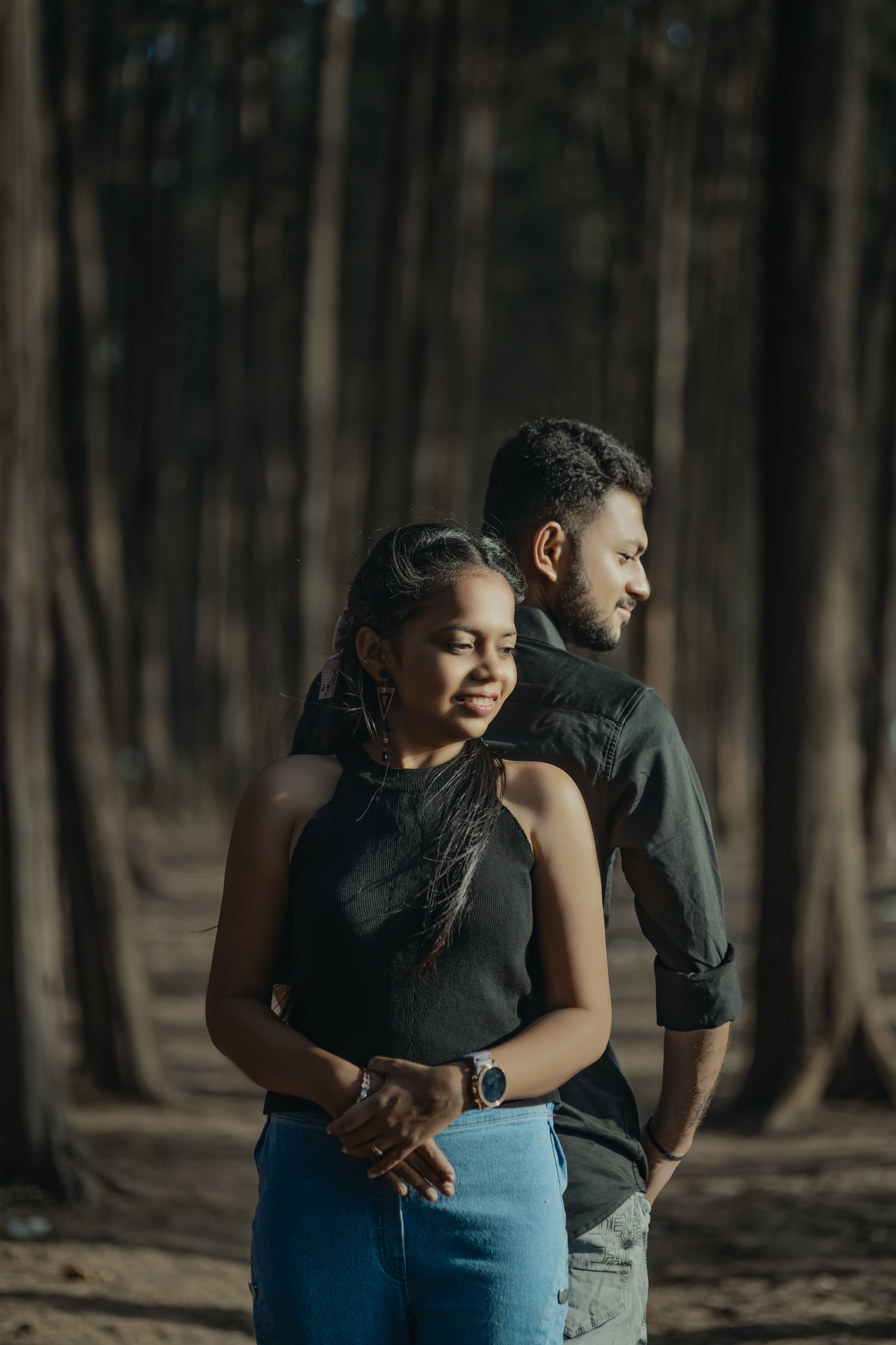 Woman and Man Standing Together in Forest · Free Stock Photo