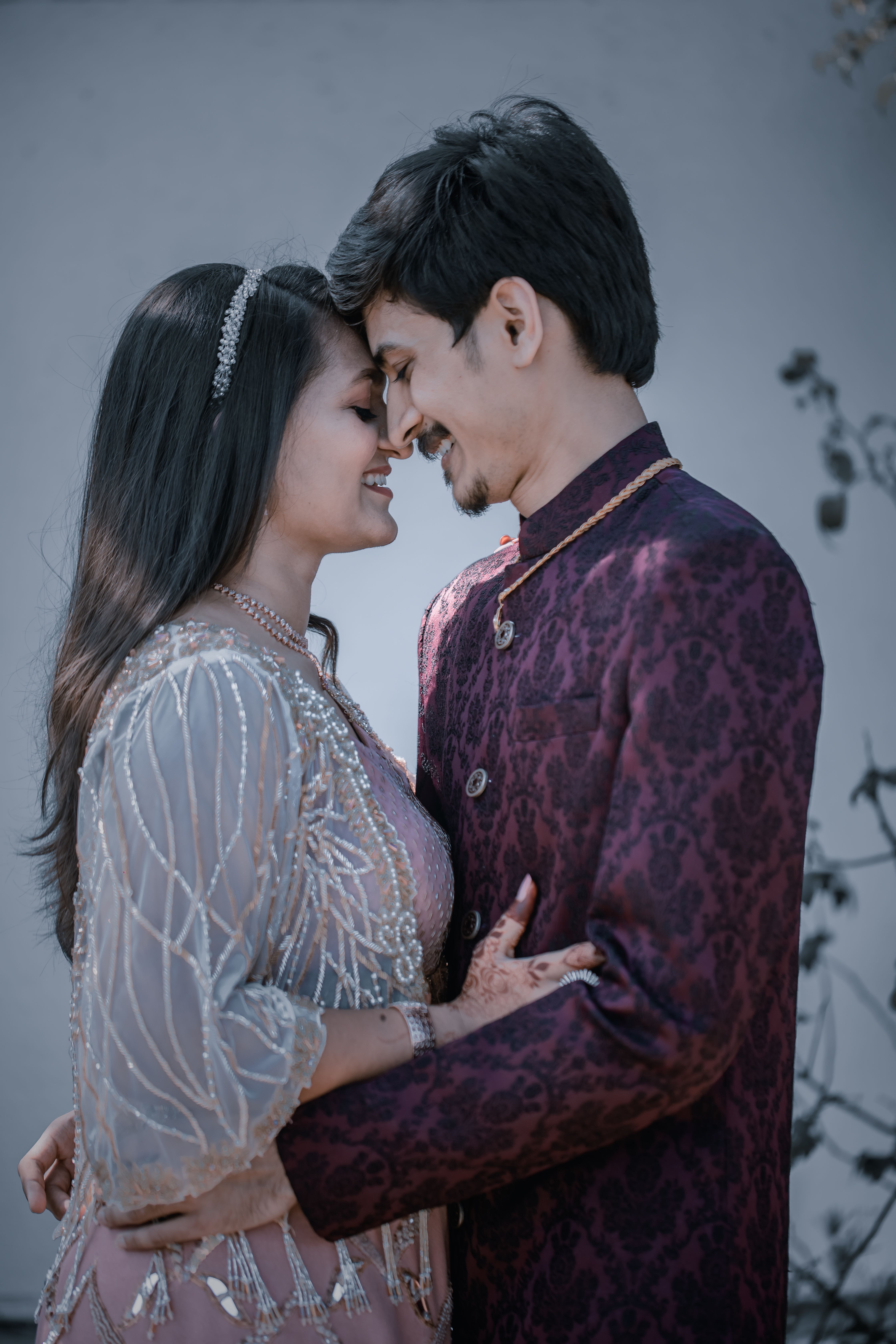 Hugging Couple in Traditional Clothing · Free Stock Photo