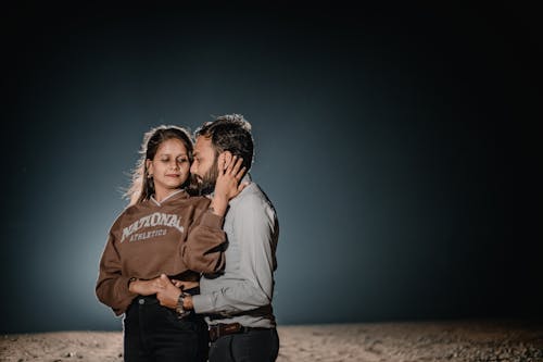 Couple Standing and Holding Hands