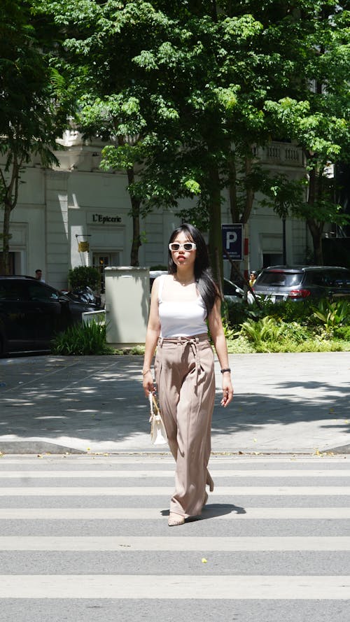 Brunette in Wide Pants on Crosswalk