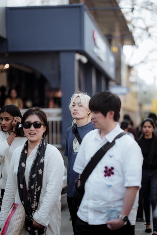 Free Crowded street in Bengaluru showing diverse people walking in an urban setting. Stock Photo