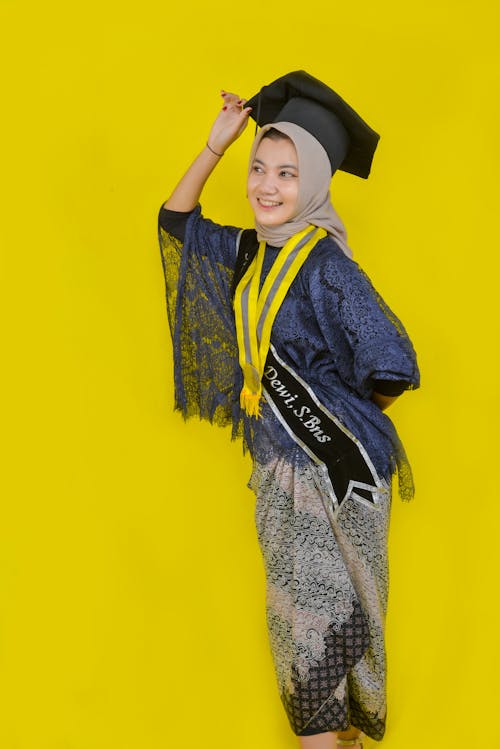 Smiling Graduate in Academic Hat