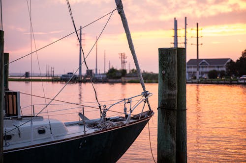 Moored Sailboat at Sunset