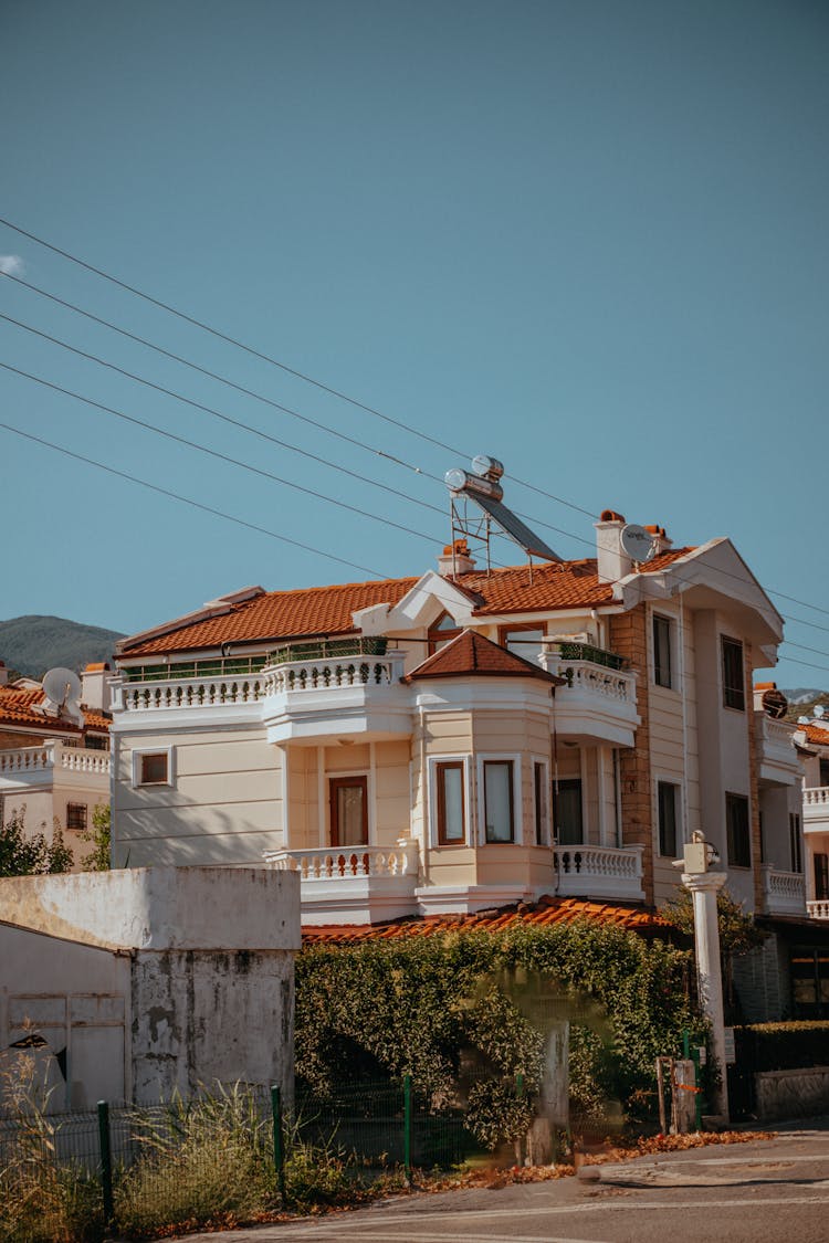 Cottage House On A Suburban Street