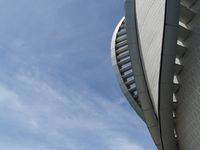 A curved roof edge against open sky. Photo by terry narcissan tsui on Pexels