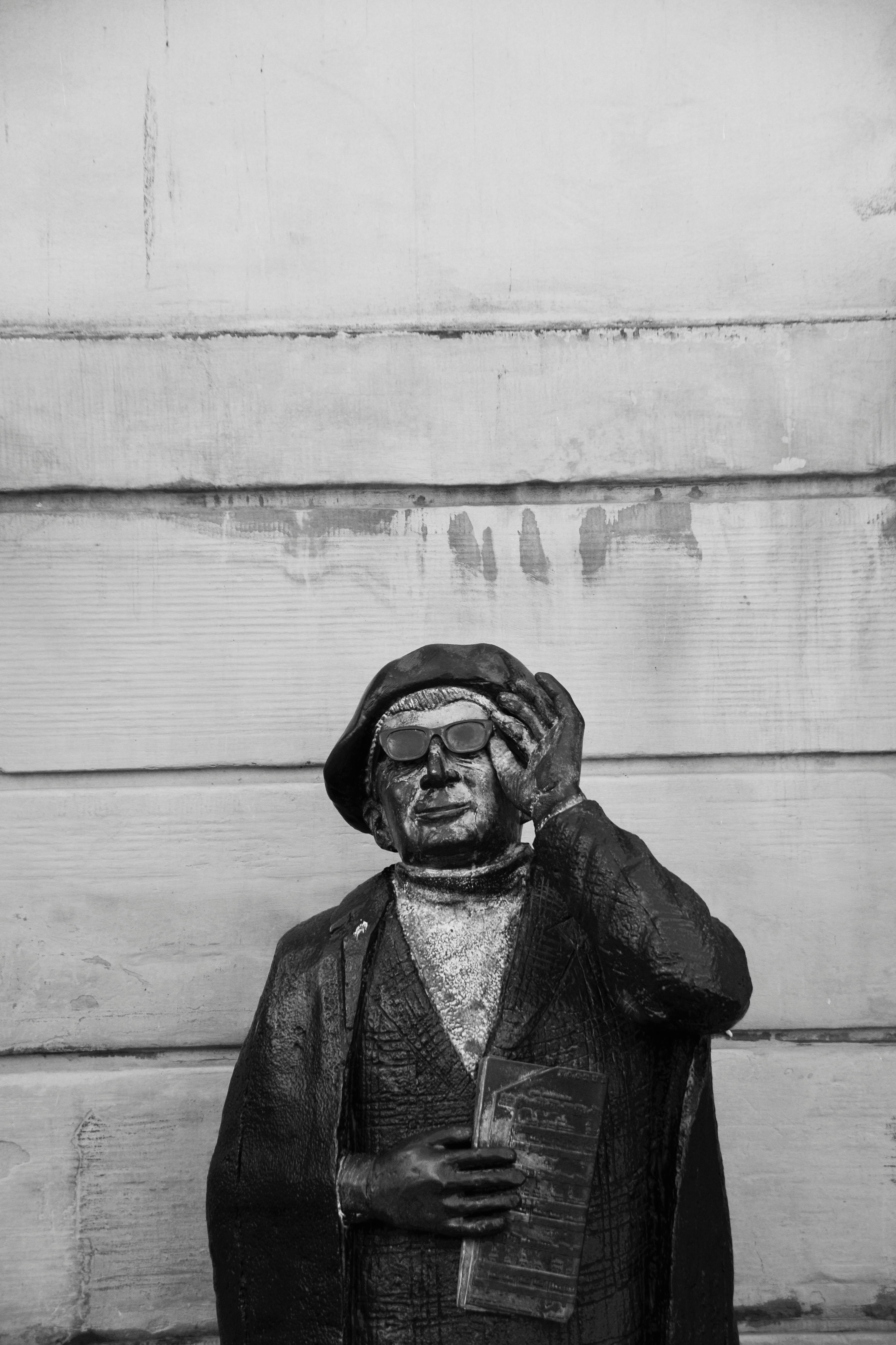 Statue of Man with Wing in Ancient Armour · Free Stock Photo