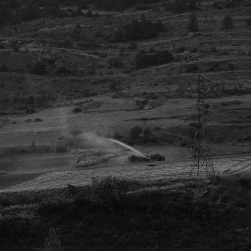 Hills and Field in Countryside in Black and White