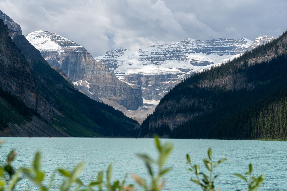 Lake Louise with mountains and glacier reflected in the water