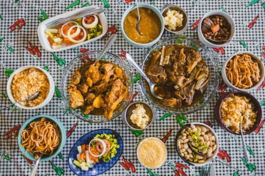 A diverse Brazilian feast displayed in a traditional setting, showcasing local cuisine varieties.