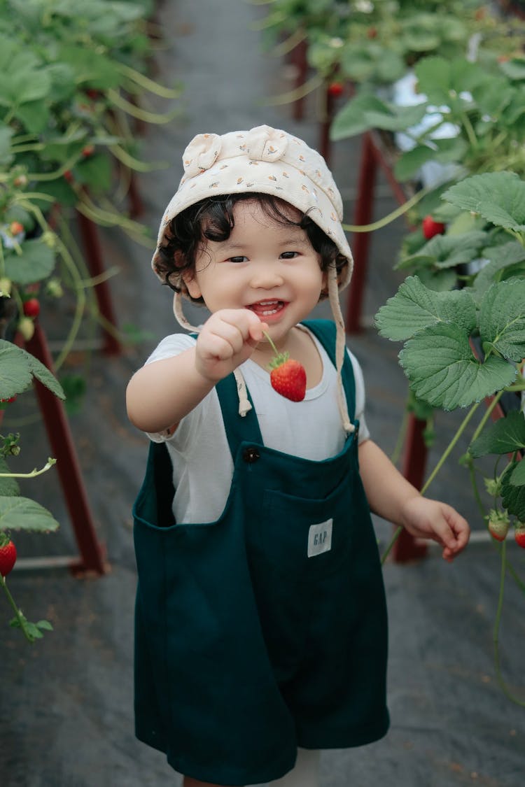 Little Girl In A Green House