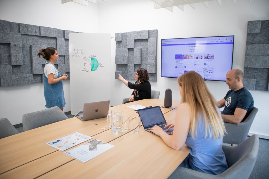 team meeting discussing digital strategy
