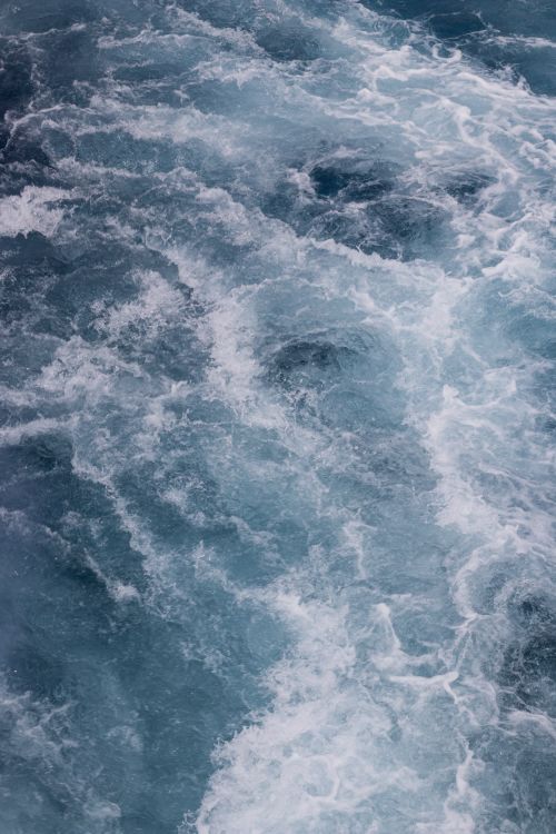 Free Captivating view of ocean waves creating patterns and textures in the water surface. Stock Photo
