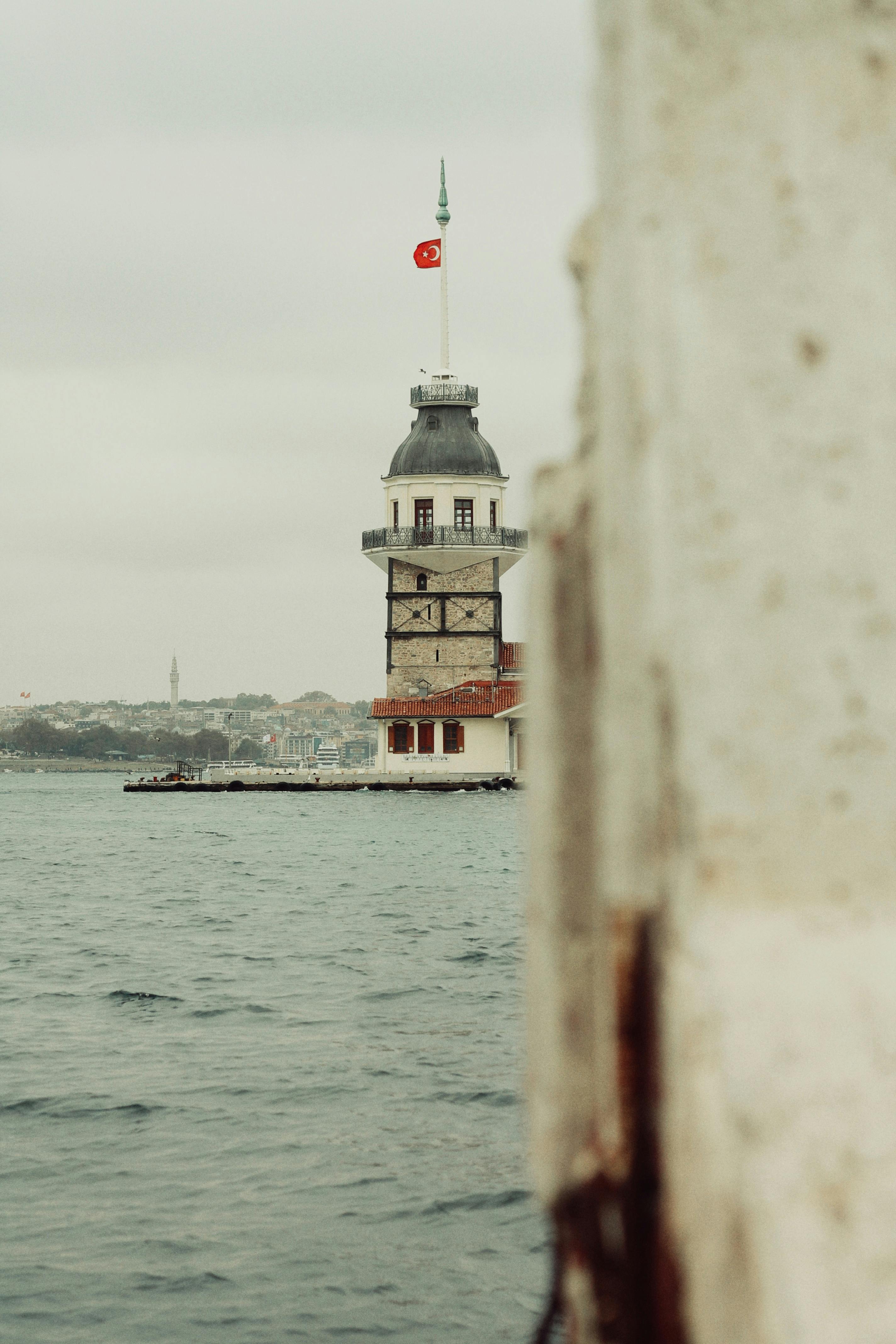 a view of a tower from the water