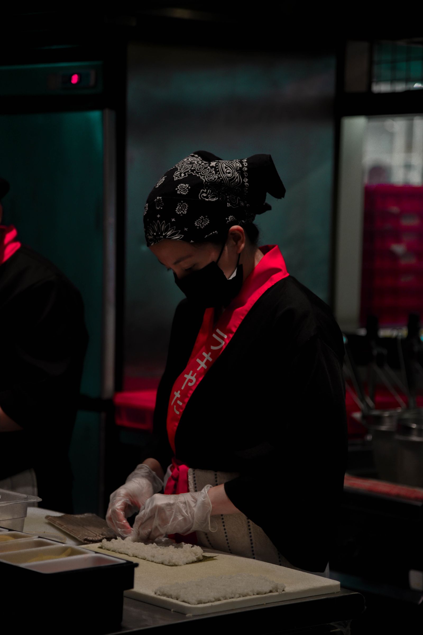 Sushi chef preparing food