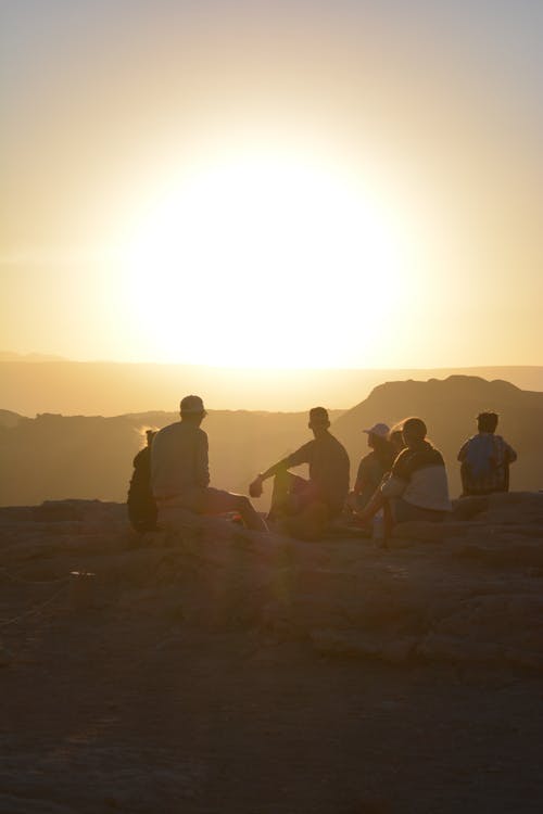 Free Group of People Near Mountain during Golden Hour Stock Photo