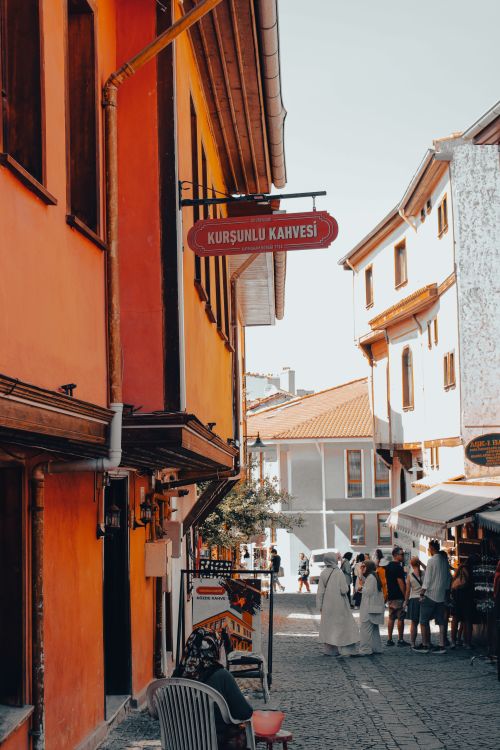 Free Bustling street in Eskişehir, Türkiye showcasing traditional architecture and lively pedestrian activity. Stock Photo