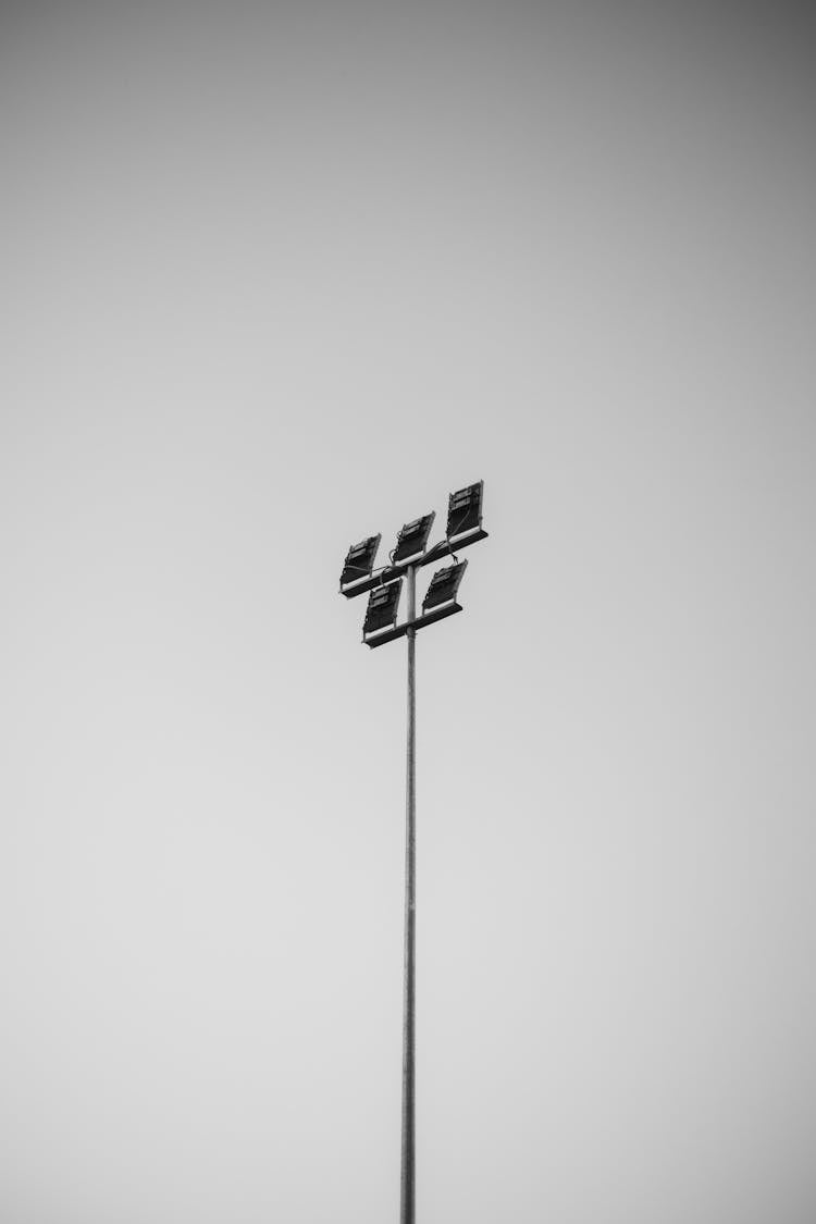 A Black And White Photo Of A Light Pole