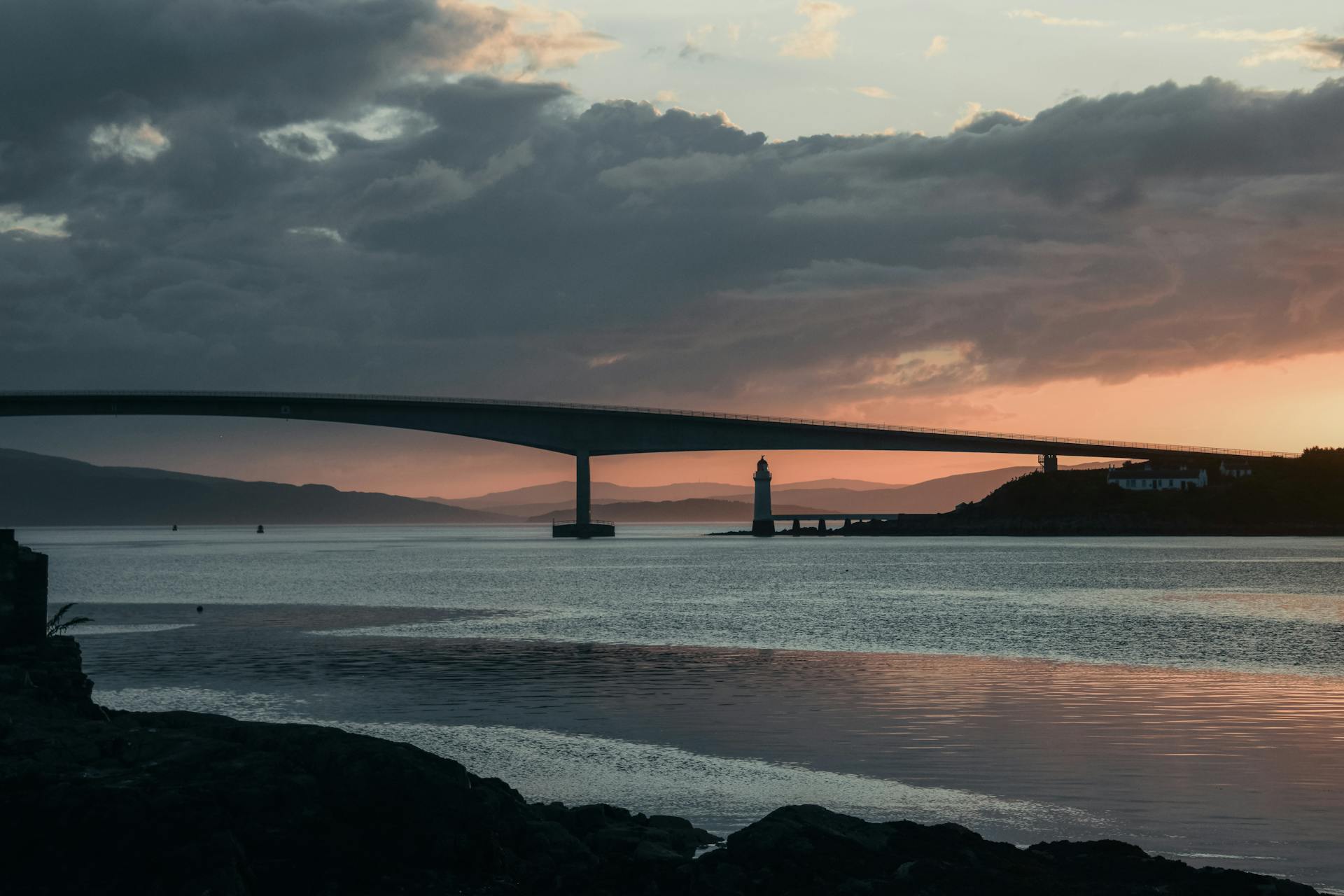 Clouds over Skye Bridge in Scotland at Sunset