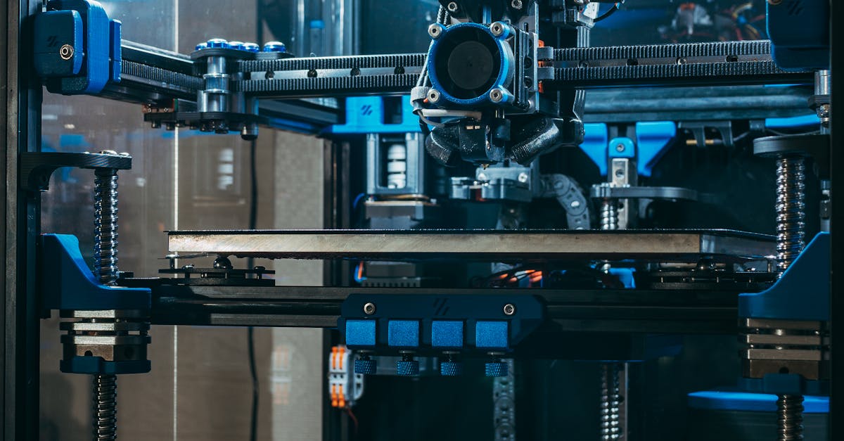 A 3d printer with blue lights and a blue light