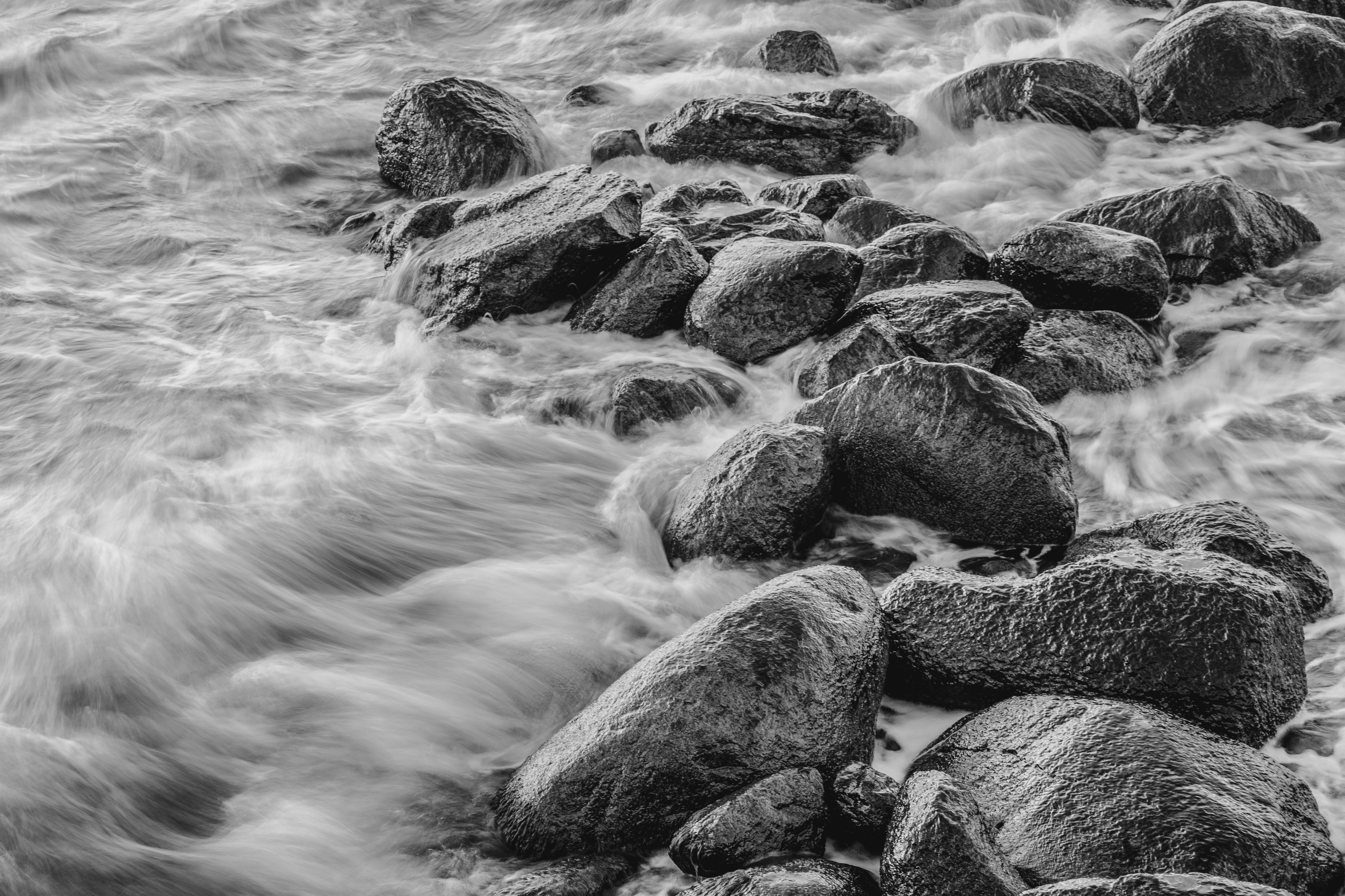 Rocks on Sea Shore in Black and White · Free Stock Photo