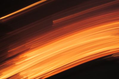 Abstract motion blur in warm amber tones — Luis Quintero on Pexels
