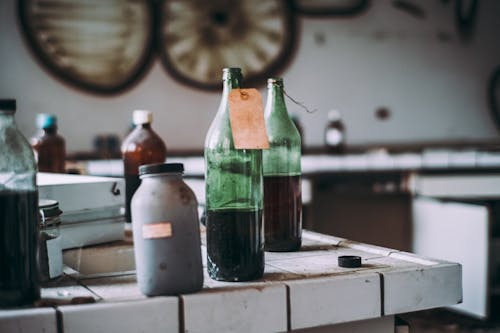 Selective Focus Photography of Filled Bottles