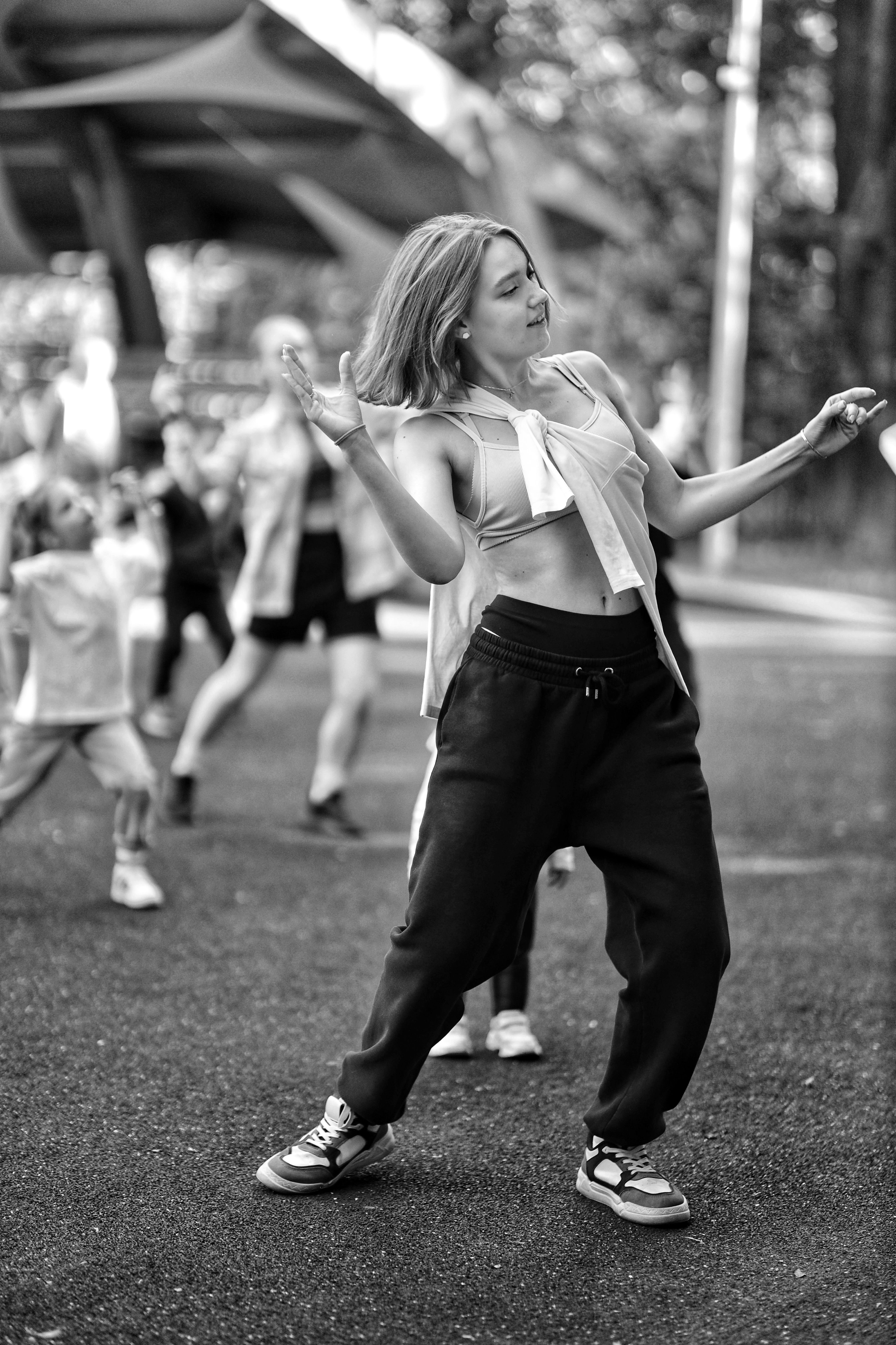 Instructor guiding breathing and movement in a studio